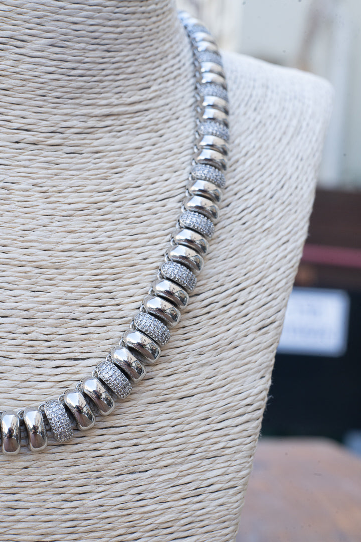Silver-tone metal chain and shiny
