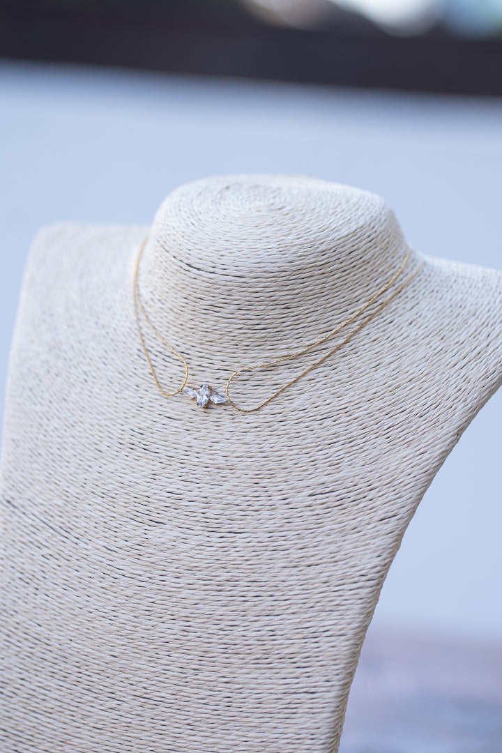 Necklace with diamond-like rhinestones.