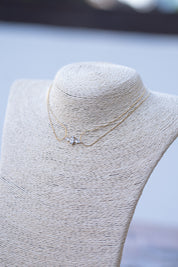 Necklace with diamond-like rhinestones.