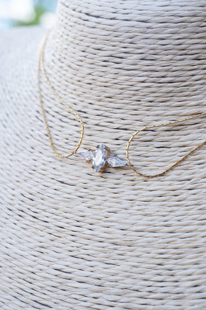 Necklace with diamond-like rhinestones.