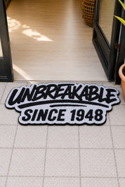 UNBREAKABLE SINCE 1948 RUG